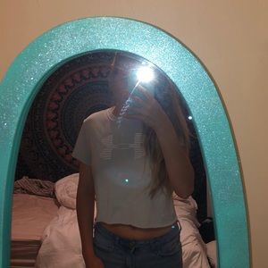 Blue cropped under armour shirt